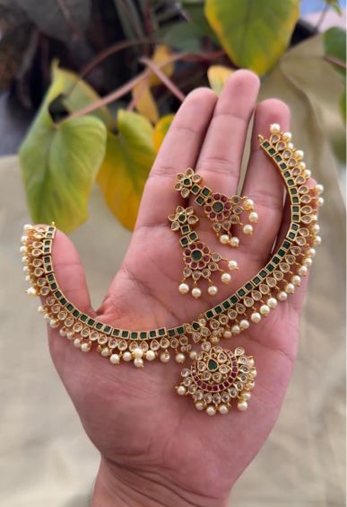 Bridal green stone attigai-Traditional south indian premium neckwear with earrings- Zivara Fashion- latest jewellery design.