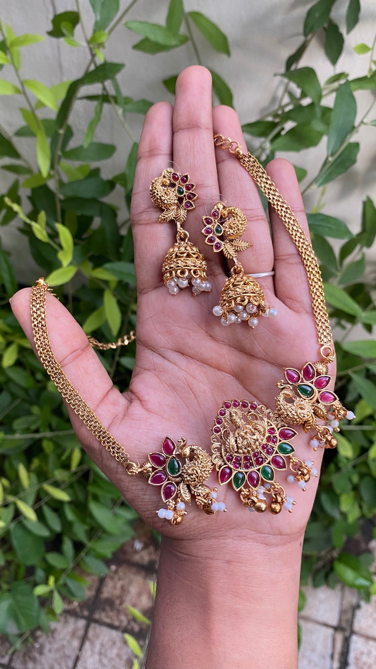 Ruby and Green- Trending temple peacock choker with earrings-latest south indian jewellery