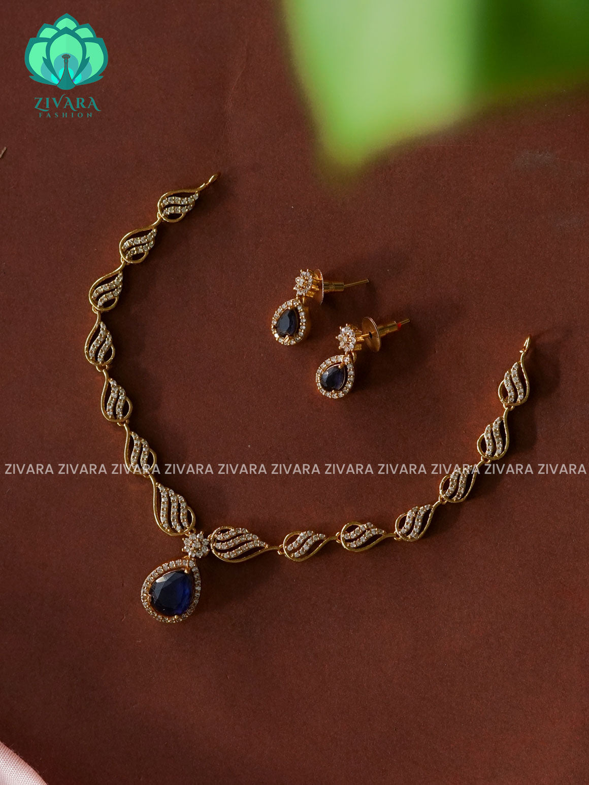 Swirly BLUE stone pendant  - stylish and minimal elegant neckwear with earrings- Zivara Fashion