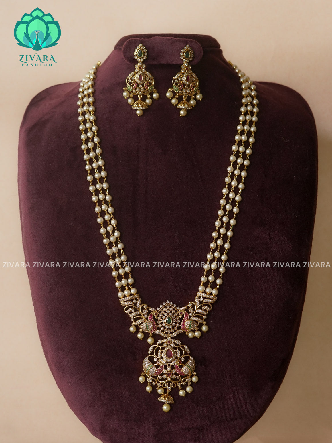 RUBY AND GREEN- PEACOCK -PEARL CHAIN - Traditional PREMIUM MATTE polish MIDCHEST haaram/neckwear with earrings- Zivara Fashion