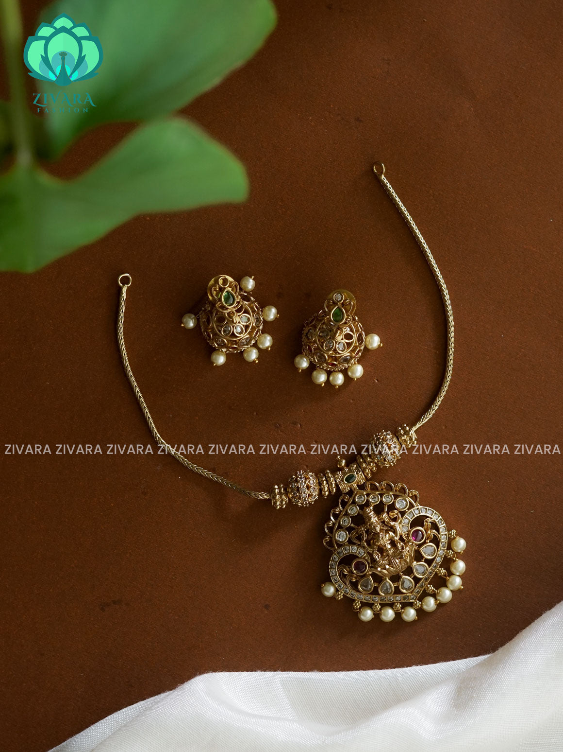 Flexible chain temple pendant-Traditional south indian premium neckwear with earrings- Zivara Fashion- latest jewellery design.