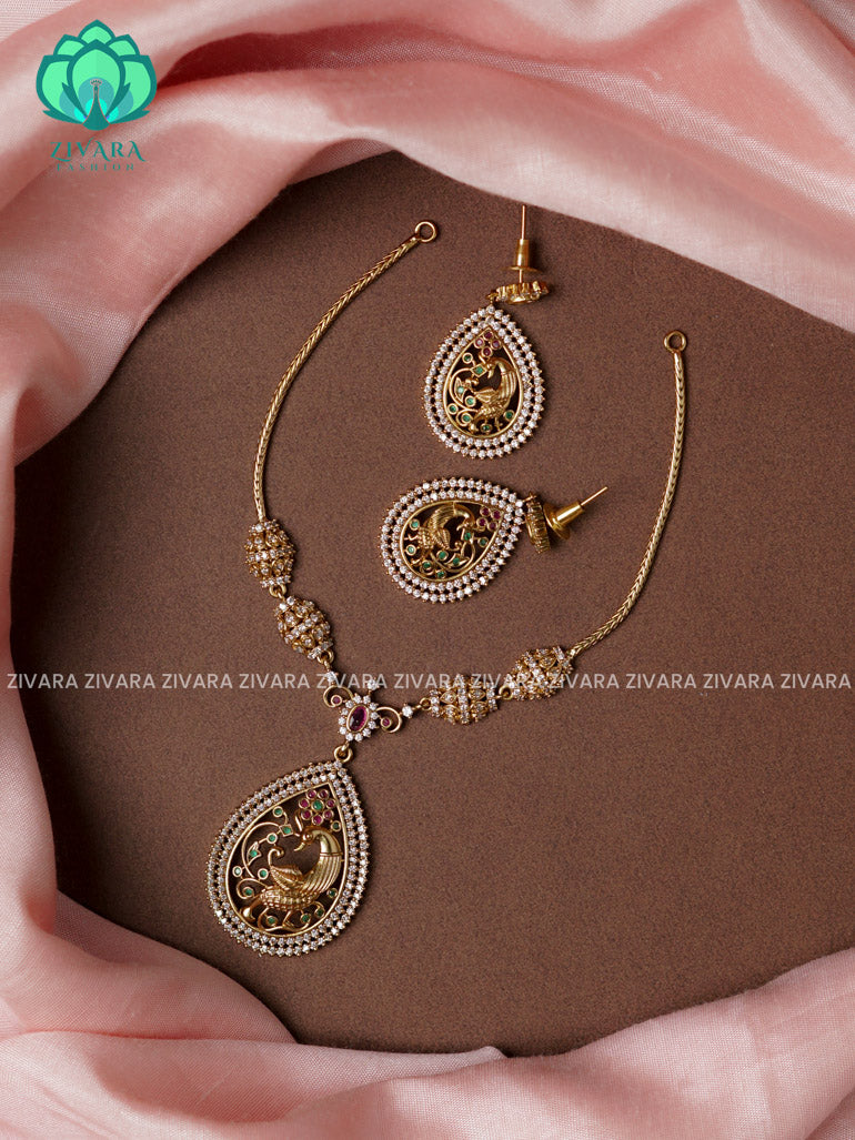 Flexible chain and PEACOCK pendant -Traditional south indian premium neckwear with earrings- Zivara Fashion- latest jewellery design.