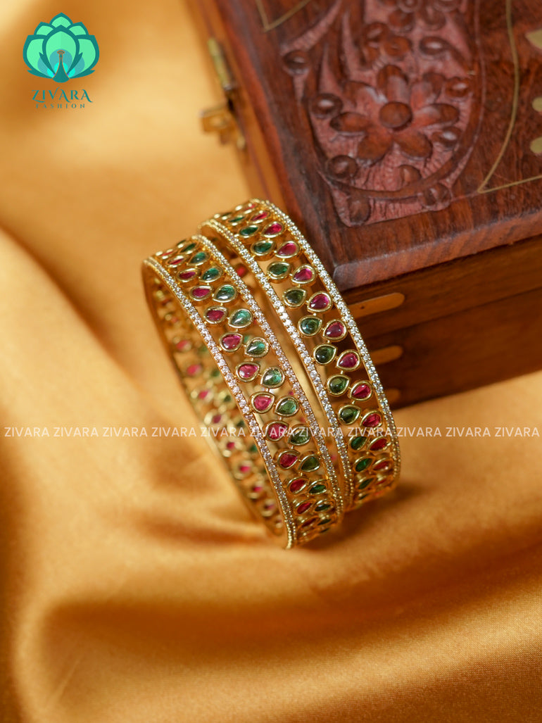 WAVY RUBY AND GREEN STONE -Premium GOLD FINISH bangles- latest jewellery collection- Zivara Fashion
