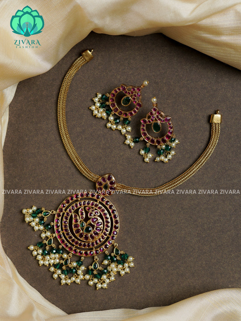 Flexible chain green beads big peacock pendant-Traditional south indian premium neckwear with earrings- Zivara Fashion- latest jewellery design.
