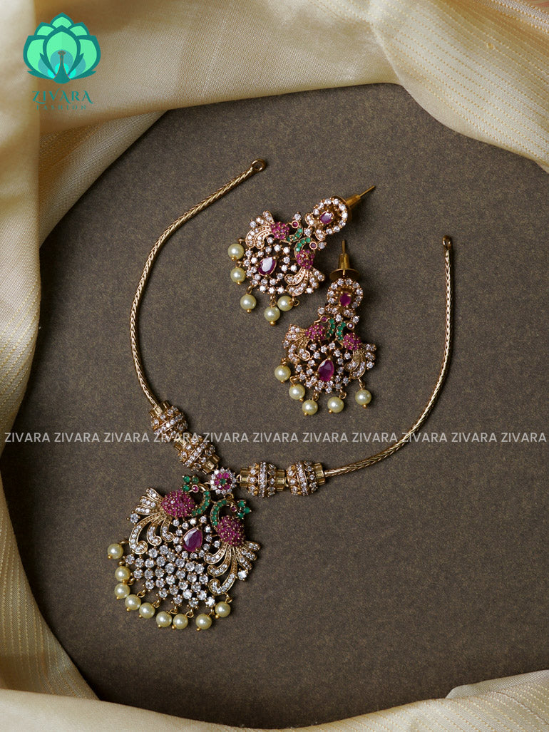 Ruby green white stone- Butter chain and peacock pendant -Traditional south indian premium neckwear with earrings- Zivara Fashion- latest jewellery design.