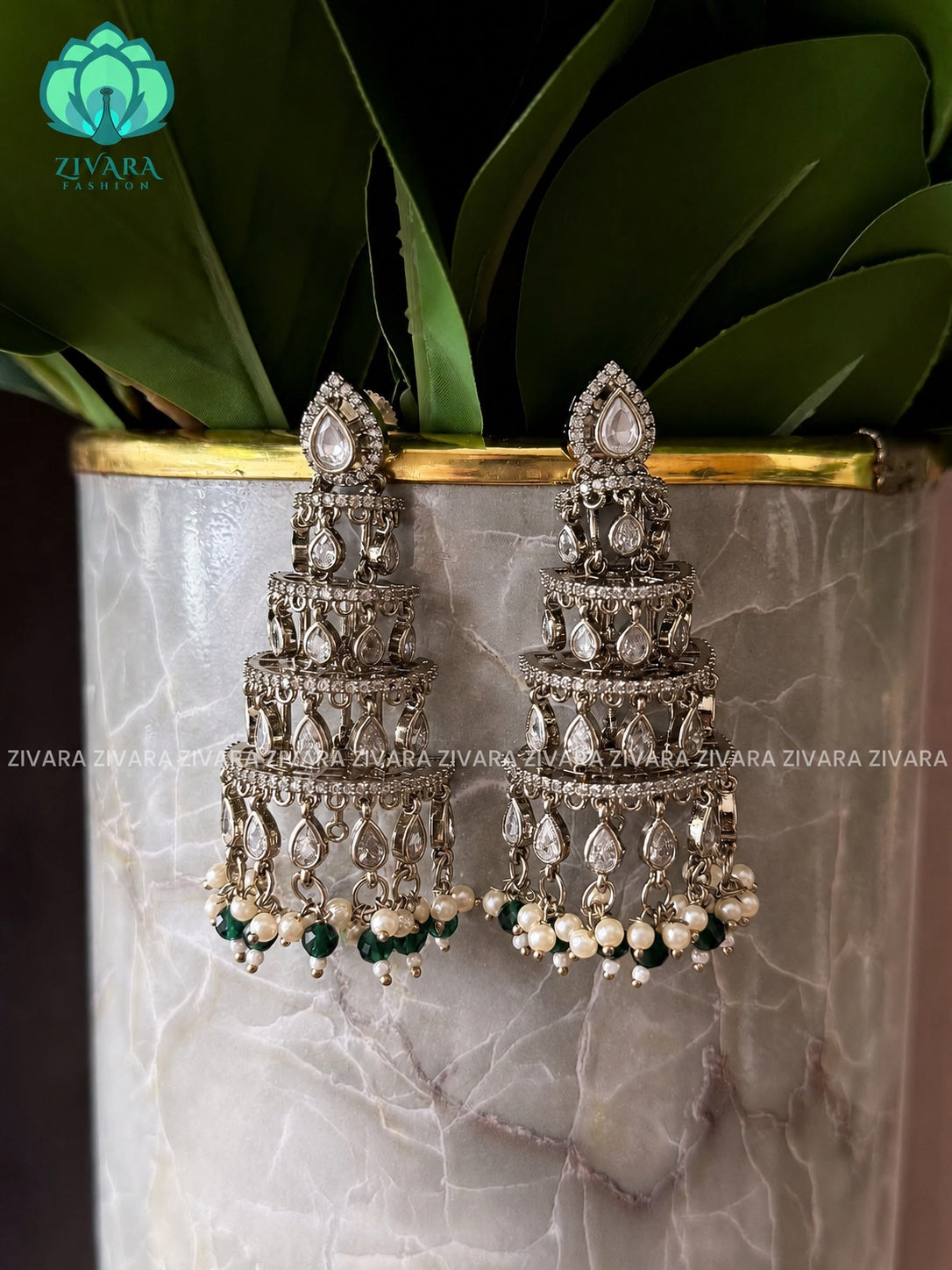 Subtle polish tower half JHUMKA- latest jewellery collection- zivara fashion