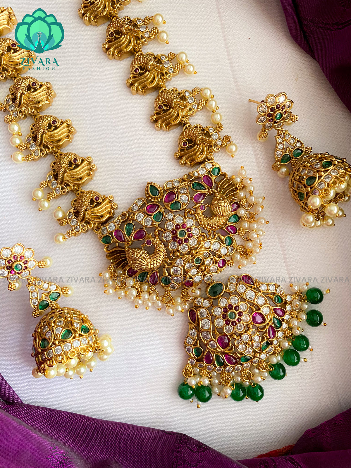 Grand peacock and stone green beads  Haaram with earrings- CZ Matte Finish- Zivara Fashion