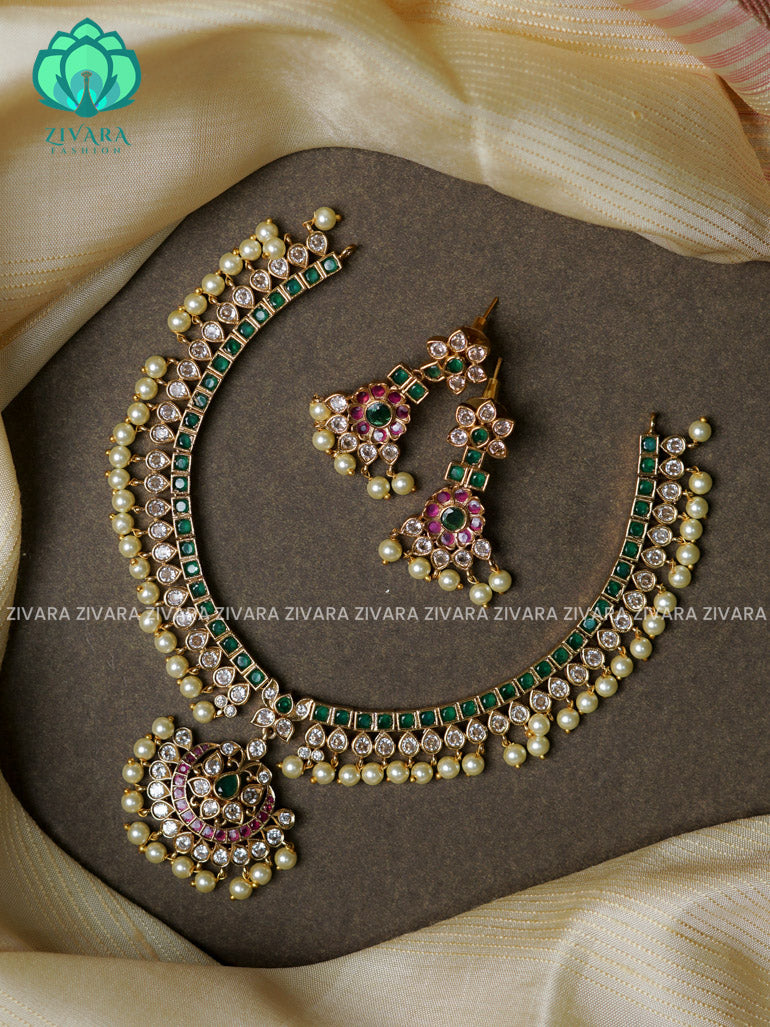 Bridal green stone attigai-Traditional south indian premium neckwear with earrings- Zivara Fashion- latest jewellery design.