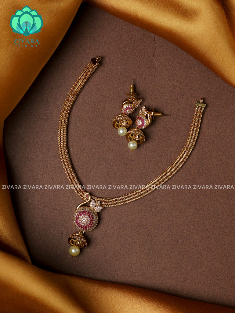 RUBY AND WHITE - Flexible chain and PEACOCK pendant -Traditional south indian premium neckwear with earrings- Zivara Fashion- latest jewellery design.