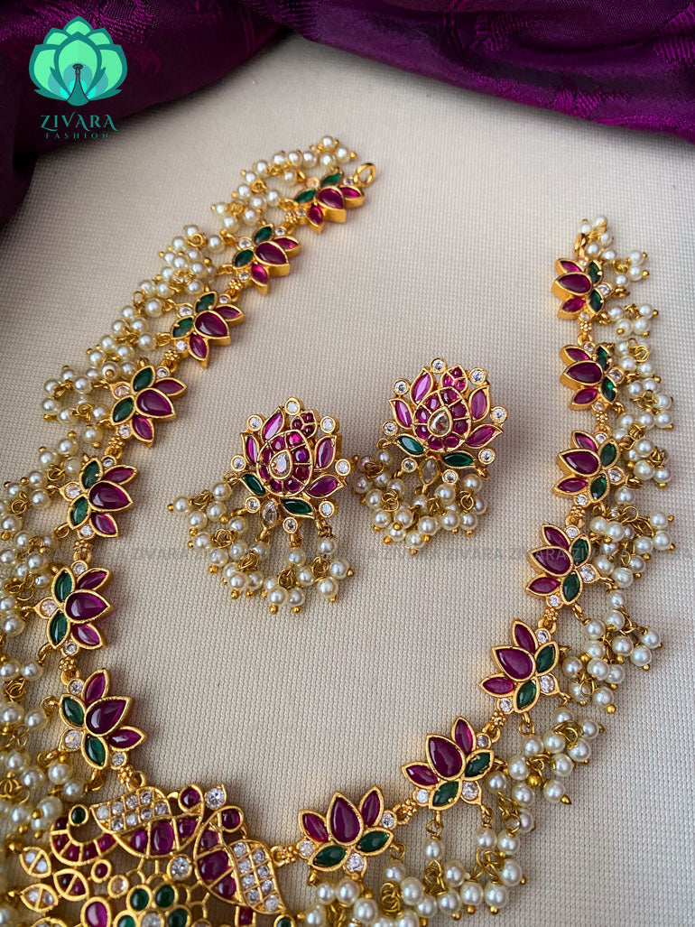 Hotselling lotus pendant real kemp stone -Traditional south indian premium neckwear with earrings- Zivara Fashion- latest jewellery design.