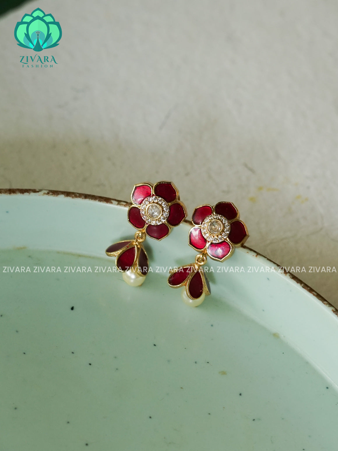 BEAUTIFUL RUBY FLOWER STUDS  - latest jewellery collection- zivara fashion