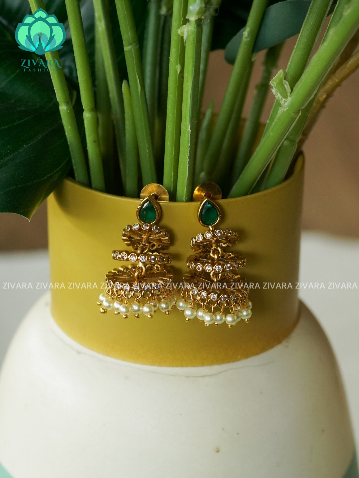 DIYA- GREEN STONE TRIPLE LAYER JHUMKAS - TRADITIONAL PREMIUM MATTE  polish JHUMKA- latest jewellery collection- zivara fashion