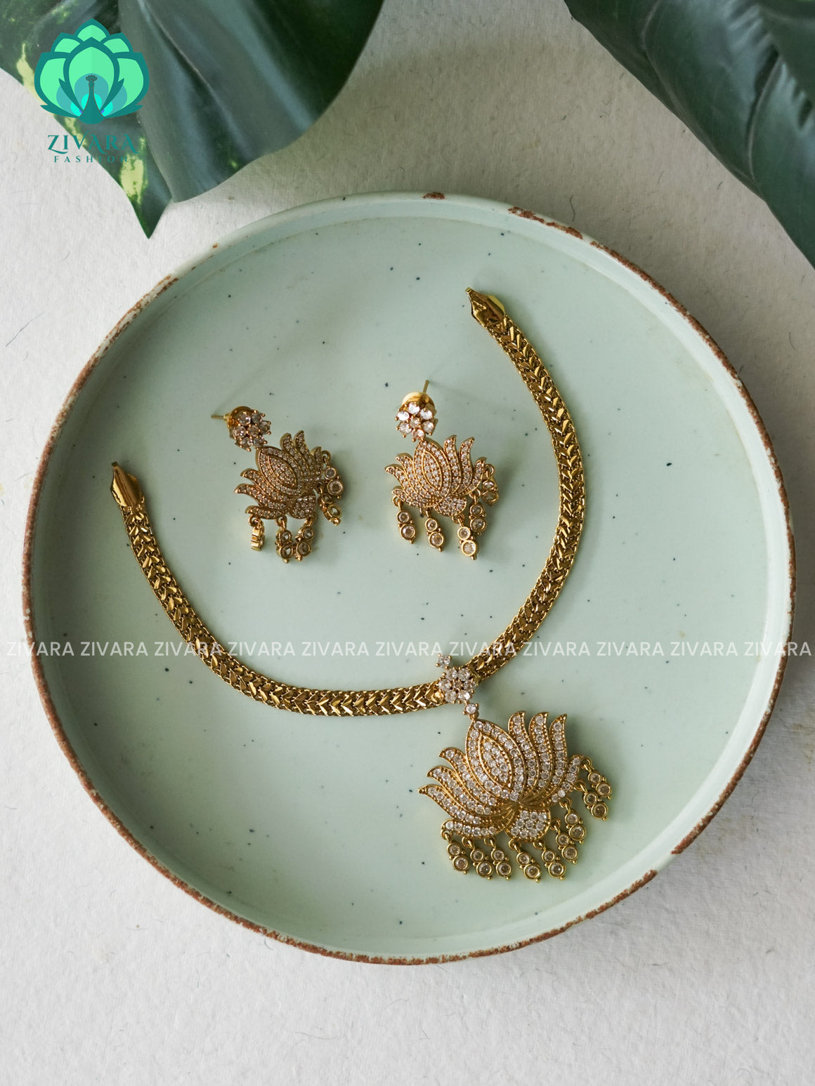 DARK POLISH WITH BRIGHT WHITE STONE LOTUS PENDANT FLEXIBLE CHAIN     -  Traditional south indian premium neckwear with earrings- Zivara Fashion- latest jewellery design