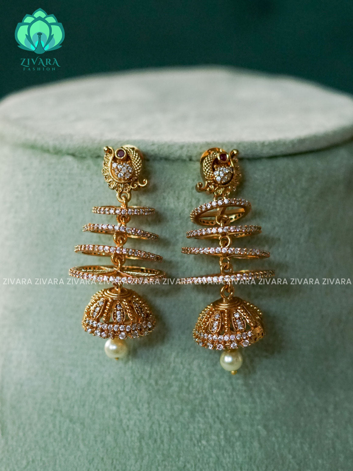 DIYA- FOUR LAYER WHITE STONE peacock - TRADITIONAL PREMIUM MATTE  polish JHUMKA- latest jewellery collection- zivara fashion