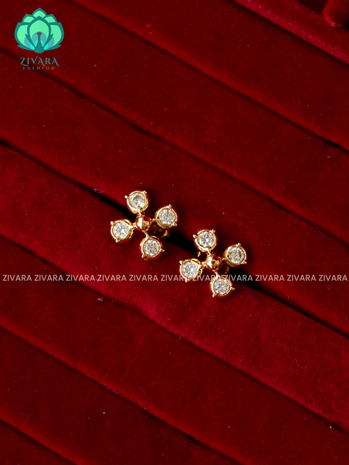 ZYRA- MEDIUM SIZE WHITE STONE FLORAL MICRO  GOLD POLISH STUD - latest jewellery collection- zivara fashion