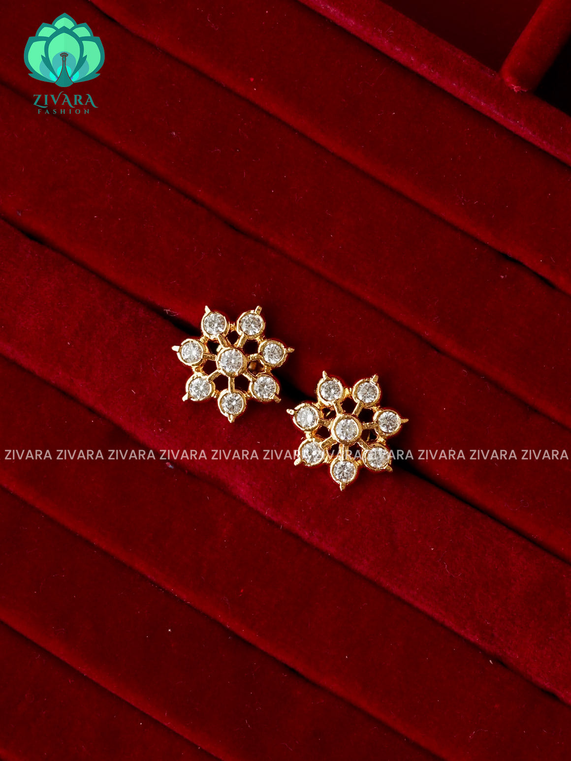 ZYRA- MEDIUM SIZE WHITE STONE FLORAL MICRO  GOLD POLISH STUD - latest jewellery collection- zivara fashion