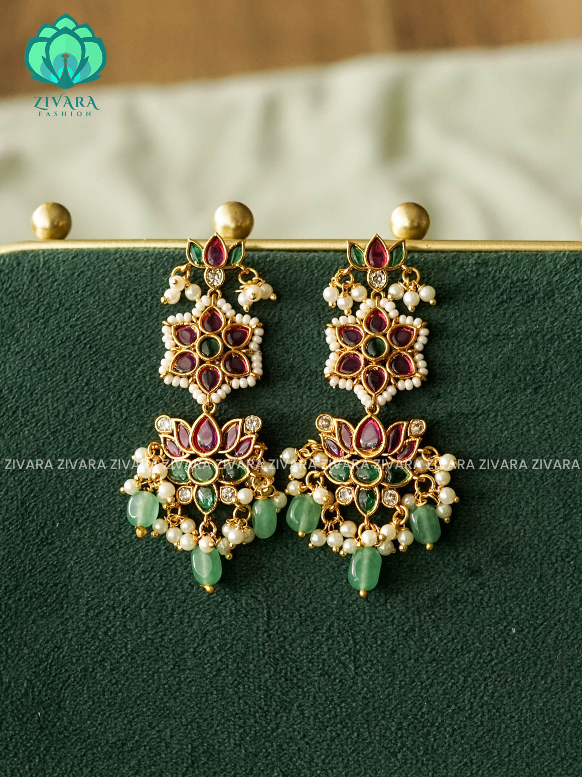 LOTUS HANGING MOTIF STUD - latest jewellery collection- zivara fashion