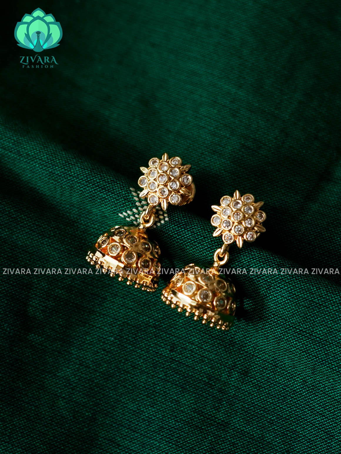 AMBIGAI - WHITE STONE MOTIF FREE MICROGOLD POLISH  JHUMKAS - Zivara Fashion- latest jewellery design