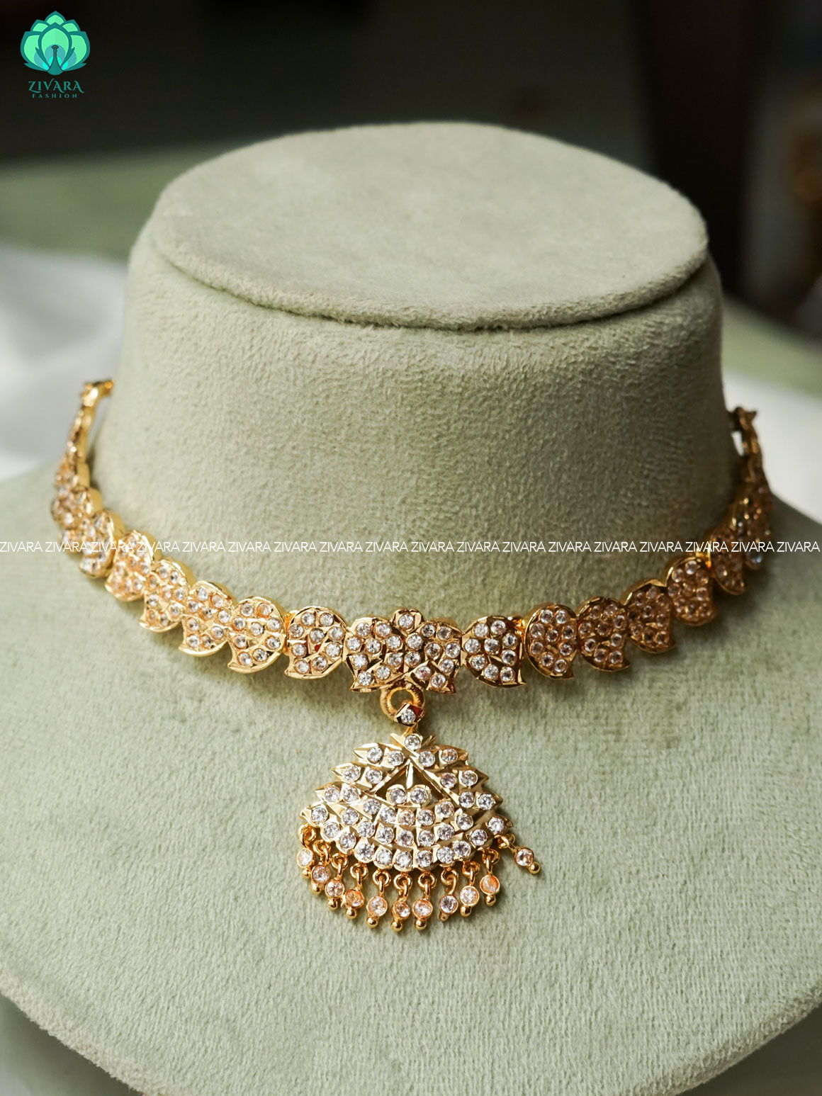 AMBIGAI-WHITE STONE MOTIF FREE MICROGOLD POLISH ATTIGAI WITH EARRING - Zivara Fashion- latest jewellery design