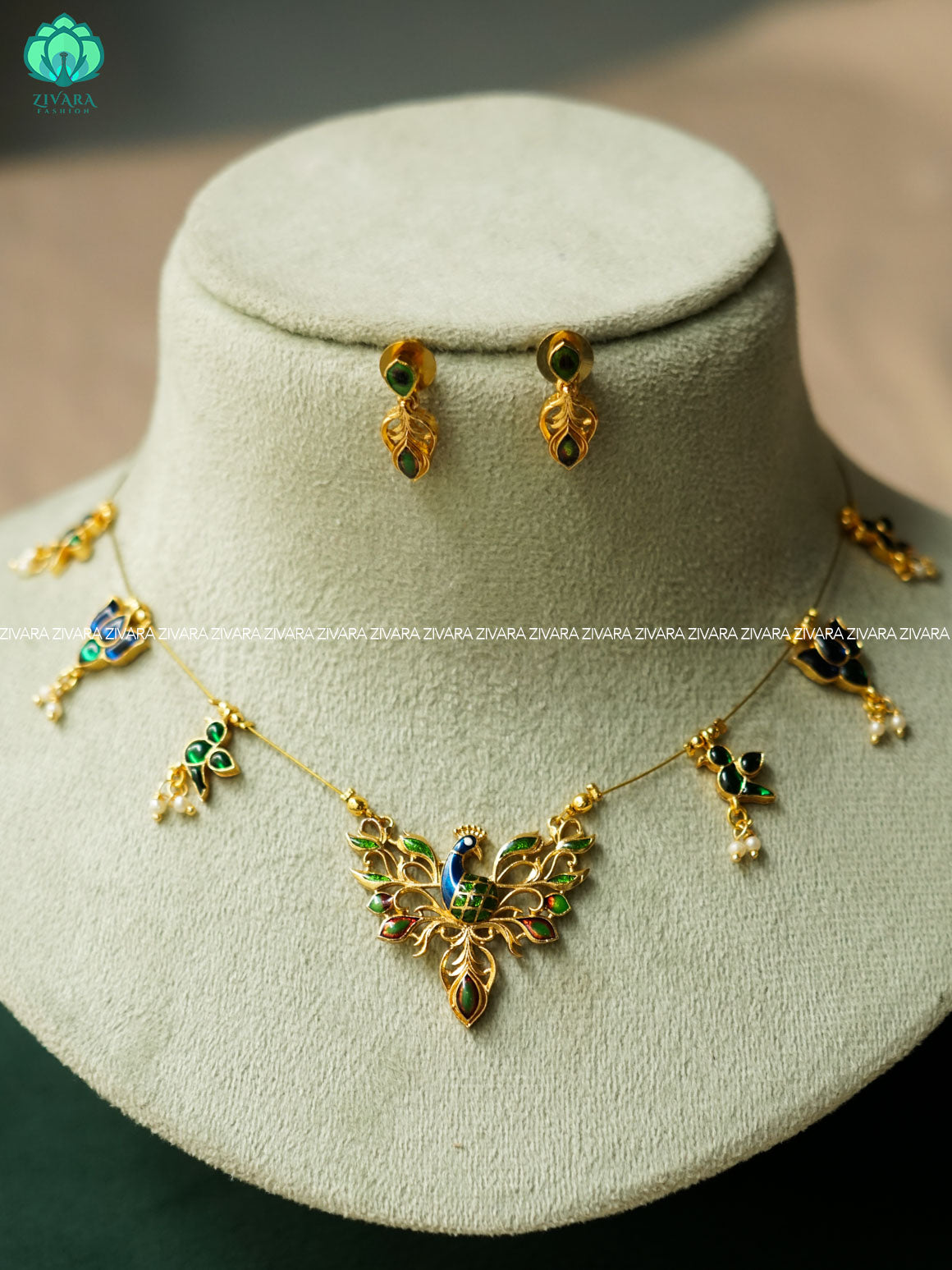 Enamel peacock with lotus hangings - TAMARA  INVISIBLE MINIMAL ELEGANT HANDMADE NECKLACE WITH BRILLIANT FINISH MOTIFS  with earrings- ZIVARA FASHION