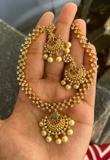 Motif free oval pendant -Traditional south indian premium neckwear with earrings- Zivara Fashion- latest jewellery design.