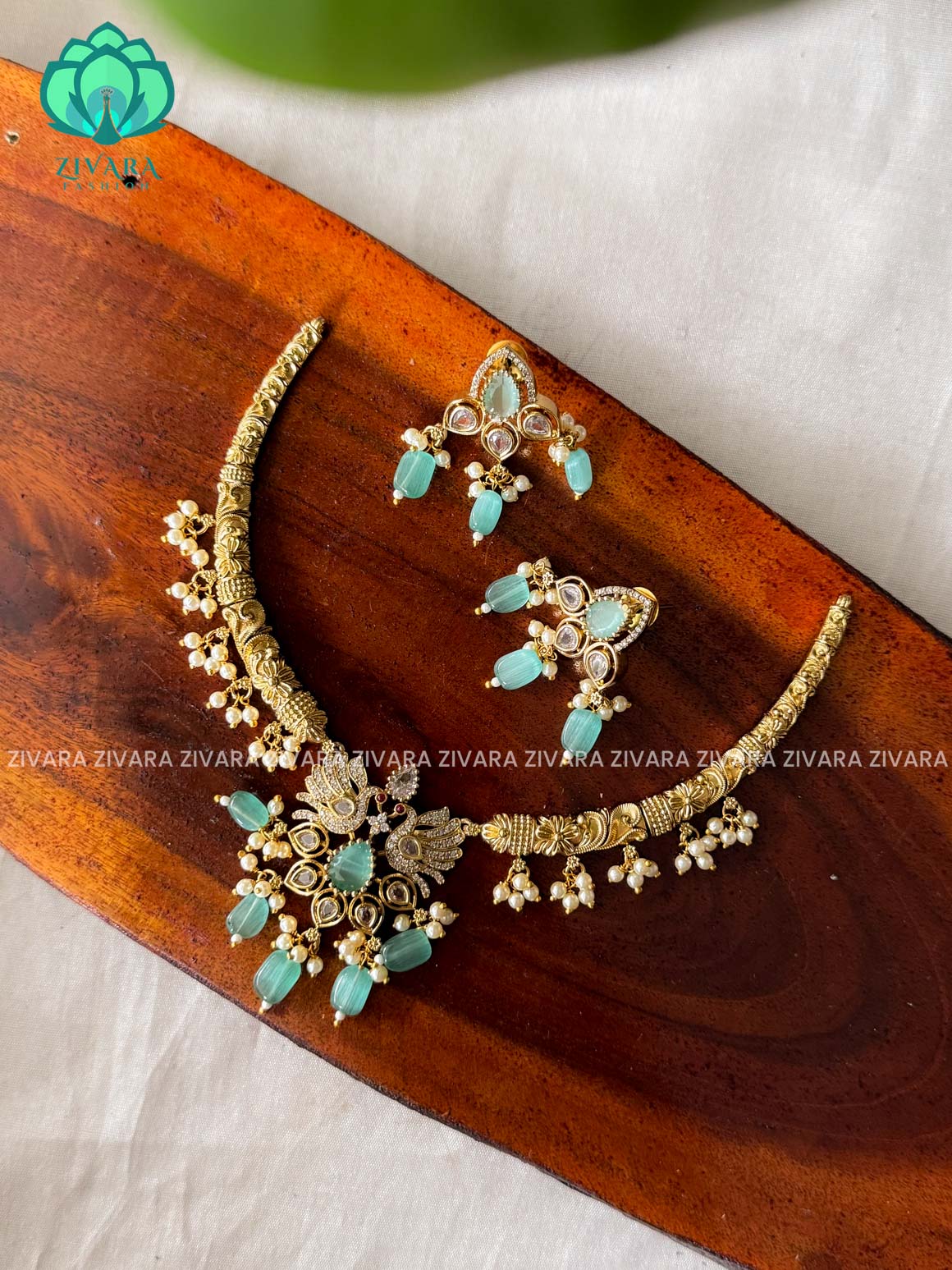 PASTEL GREEN- PEACOCK- BRILLIANT finish horn neckwear with earrings  -  latest pocket friendly south indian jewellery collection