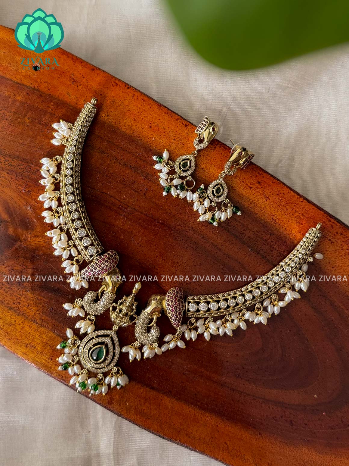 GREEN TEMPLE - SUBTLE GOLD finish horn PREMIUM neckwear with earrings  -  latest pocket friendly south indian jewellery collection