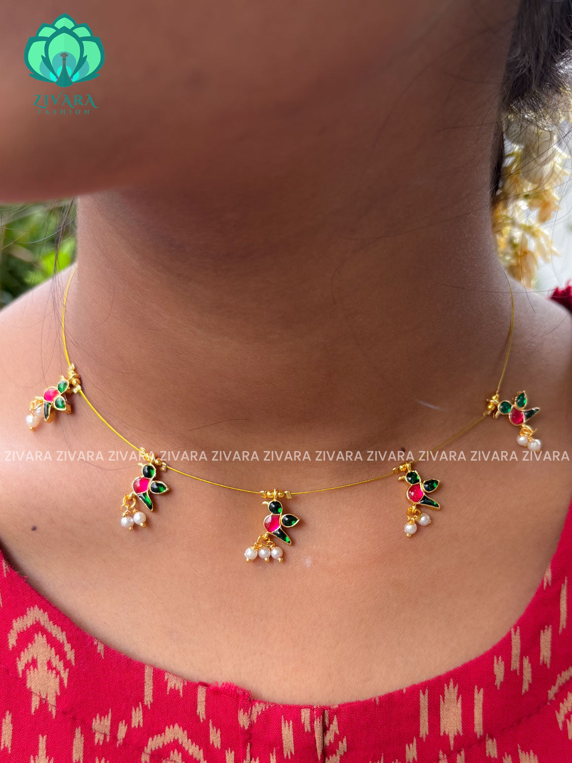 GREEN AND PINK PARROT  INVISIBLE MINIMAL ELEGANT HANDMADE NECKLACE WITH BRILLIANT FINISH MOTIFS- ZIVARA FASHION