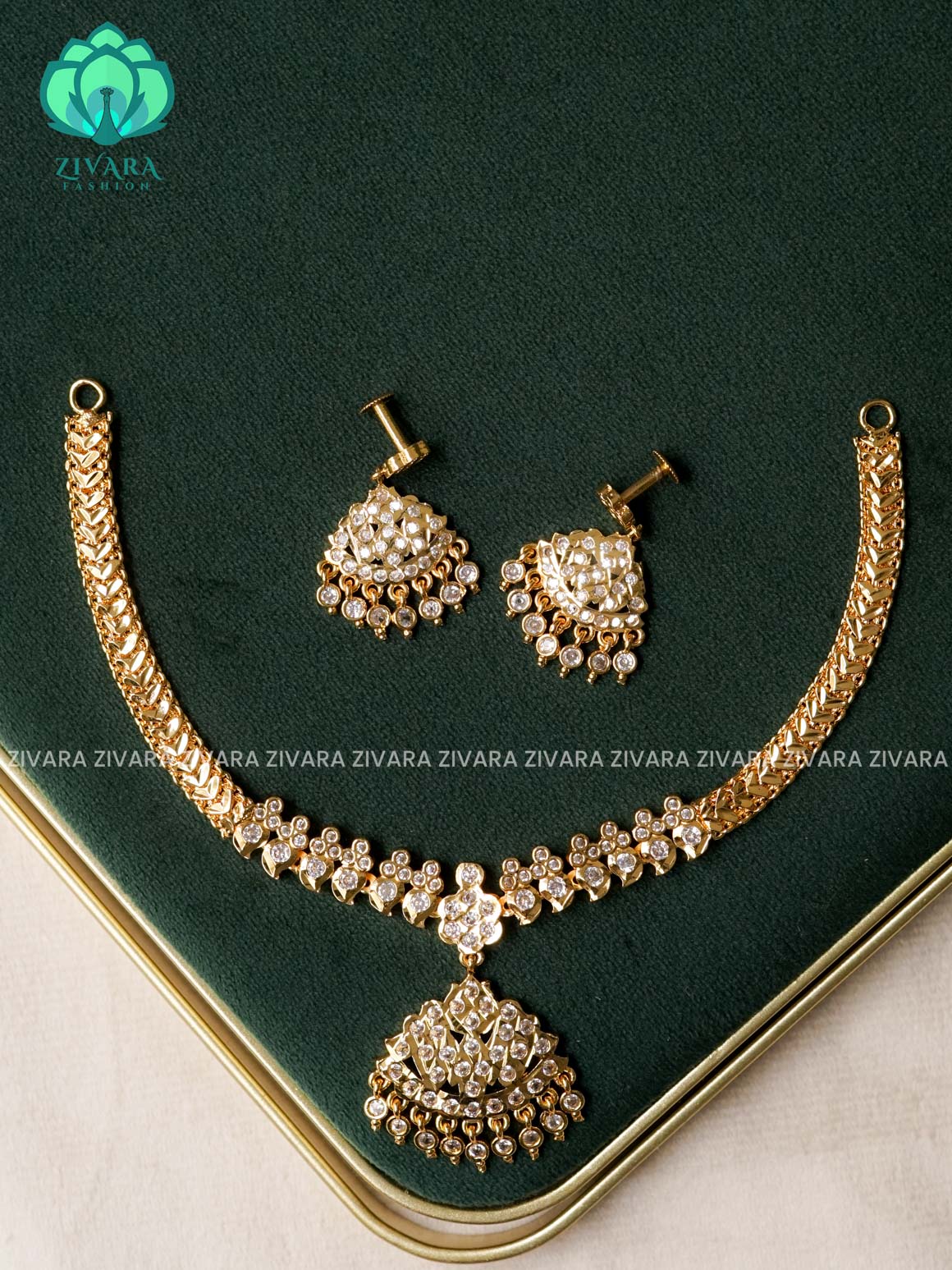 AMBIGAI - WHITE  STONE MANGA MOTIF MICROGOLD POLISH ATTIGAI WITH EARRINGS - Zivara Fashion- latest jewellery design