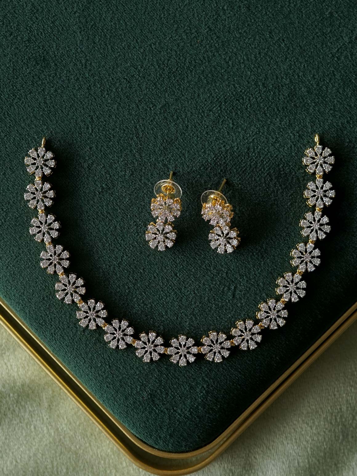 WHITE STONE 8 PETAL FLOWER  - AD MICROGOLD POLISH WITH EARRING - Zivara Fashion- latest jewellery design