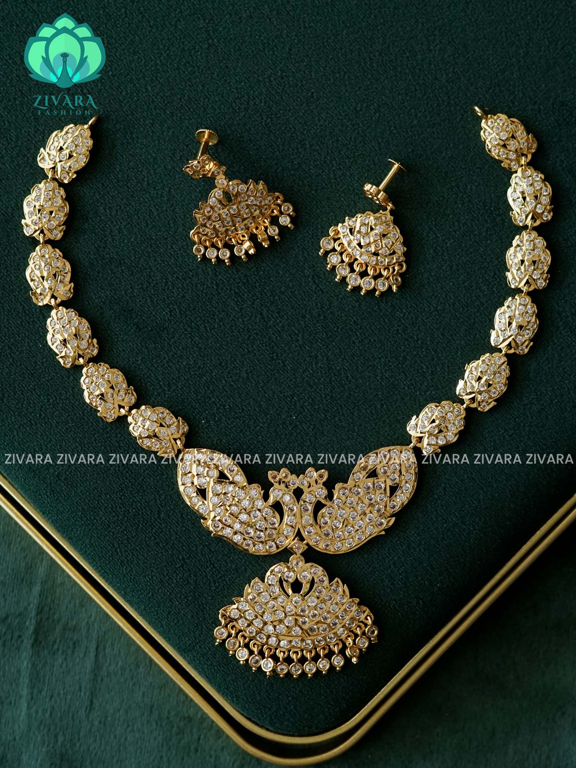 AMBIGAI- PEACOCK WHITE  STONE  MICROGOLD POLISH  - Zivara Fashion- latest jewellery design