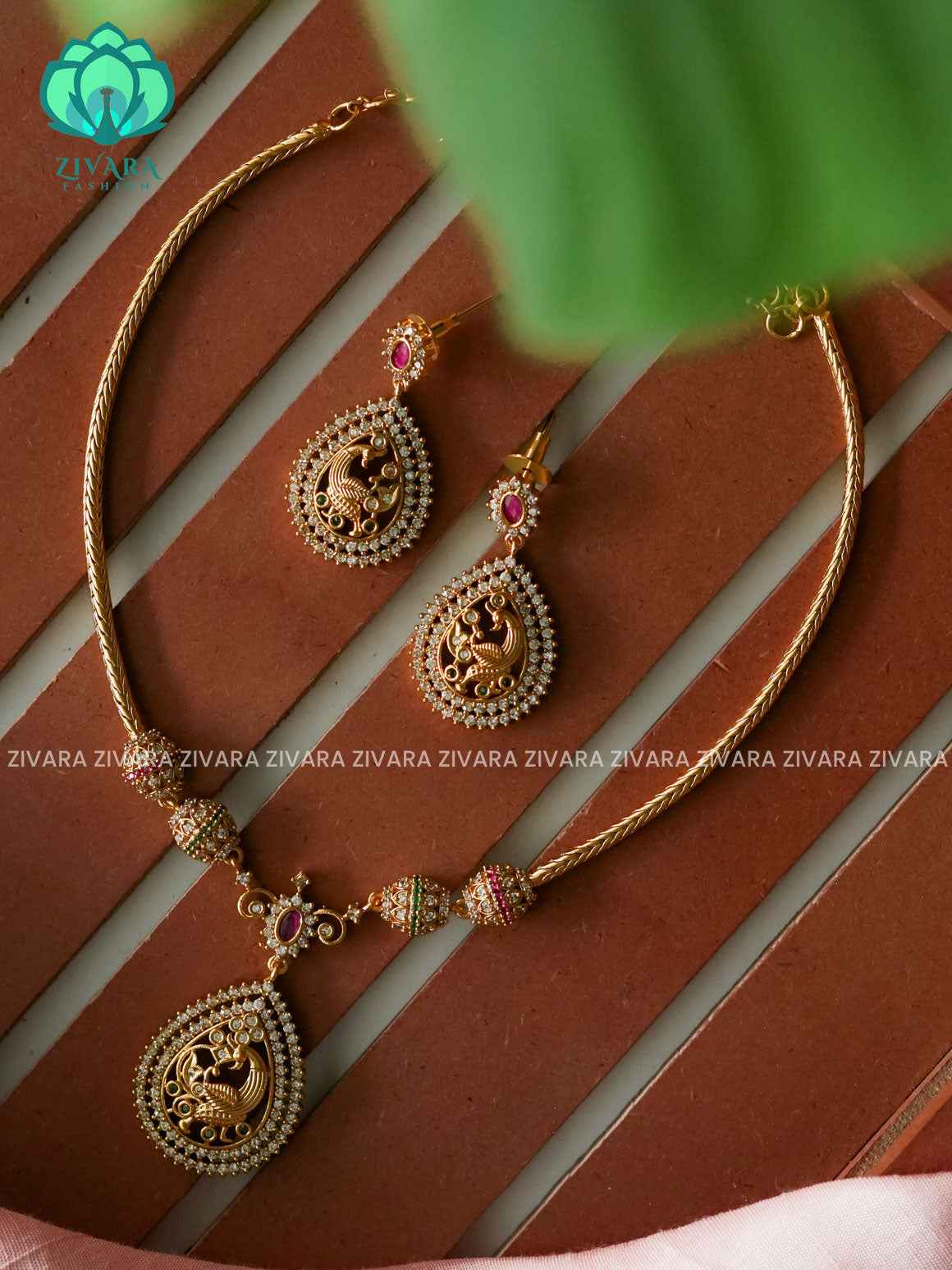 FLEXIBLE CHAIN TEAR PEACOCK PENDANT - Traditional south indian premium neckwear with earrings- Zivara Fashion- latest jewellery design