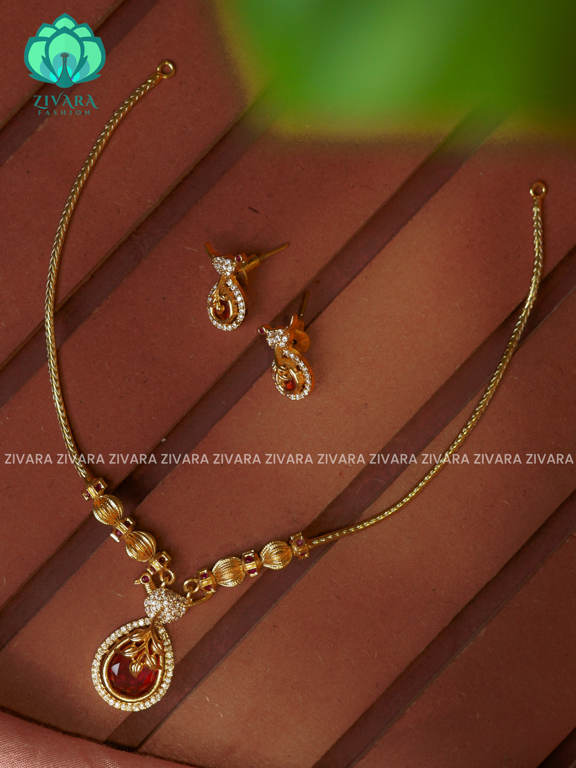 RUBY  Flexible chain TEAR  pendant -Traditional south indian premium neckwear with earrings- Zivara Fashion- latest jewellery design.