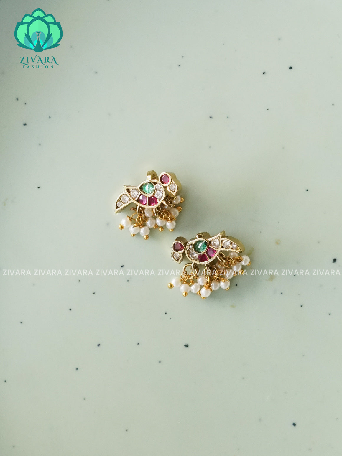 RUBY AND GREEN  PARROT MOTIF BUGADIS  - latest jewellery collection- zivara fashion