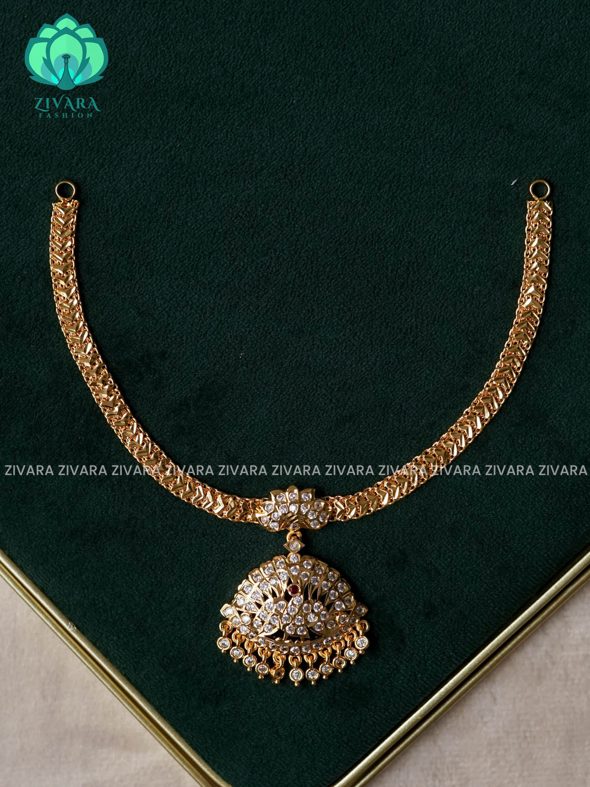AMBIGAI- PEACOCK  WHITE STONE  MICROGOLD POLISH ATTIGAI - Zivara Fashion- latest jewellery design