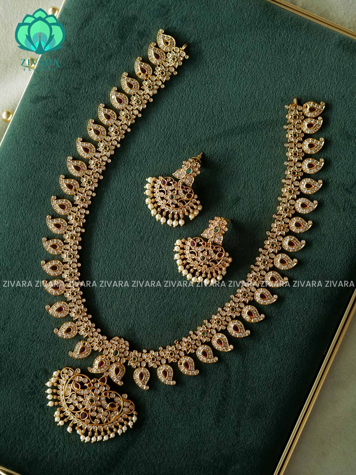 RUBY GREEN STONE MANGO WITH PEACOCK MOTIF PENDANT  - Traditional PREMIUM MATTE polish MIDCHEST haaram/neckwear with earrings- Zivara Fashion