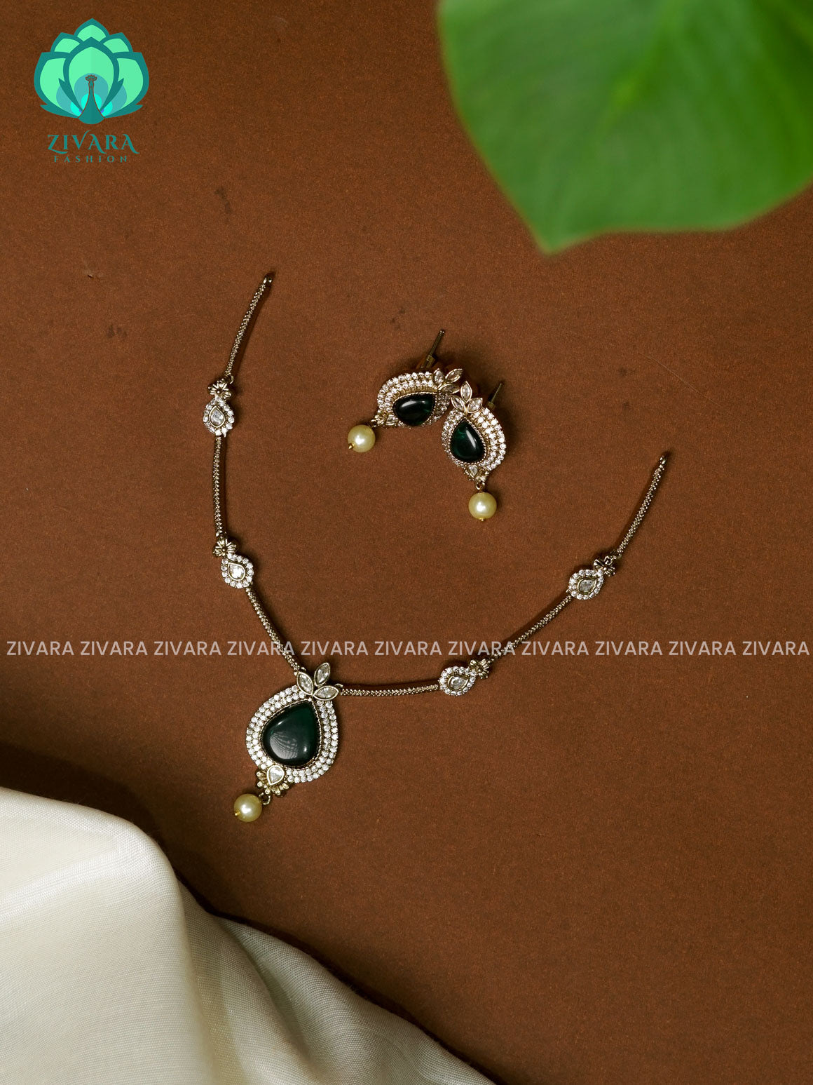 GREEN SIMPLE SUBTLE GOLD FINISH TEAR PENDANT   - stylish and minimal elegant neckwear with earrings- Zivara FashioN