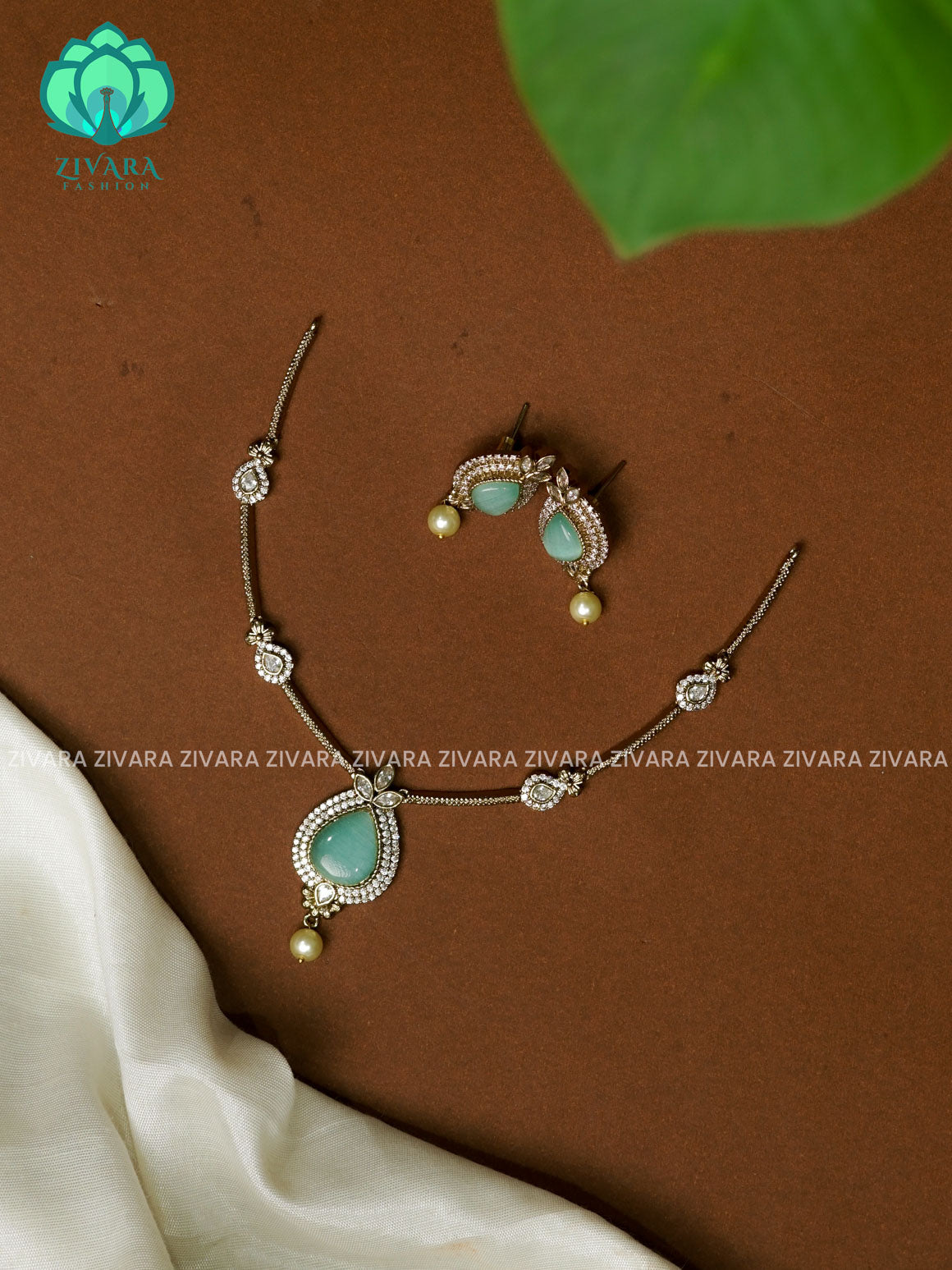 PASTEL GREEN SIMPLE SUBTLE GOLD FINISH TEAR PENDANT   - stylish and minimal elegant neckwear with earrings- Zivara FashioN