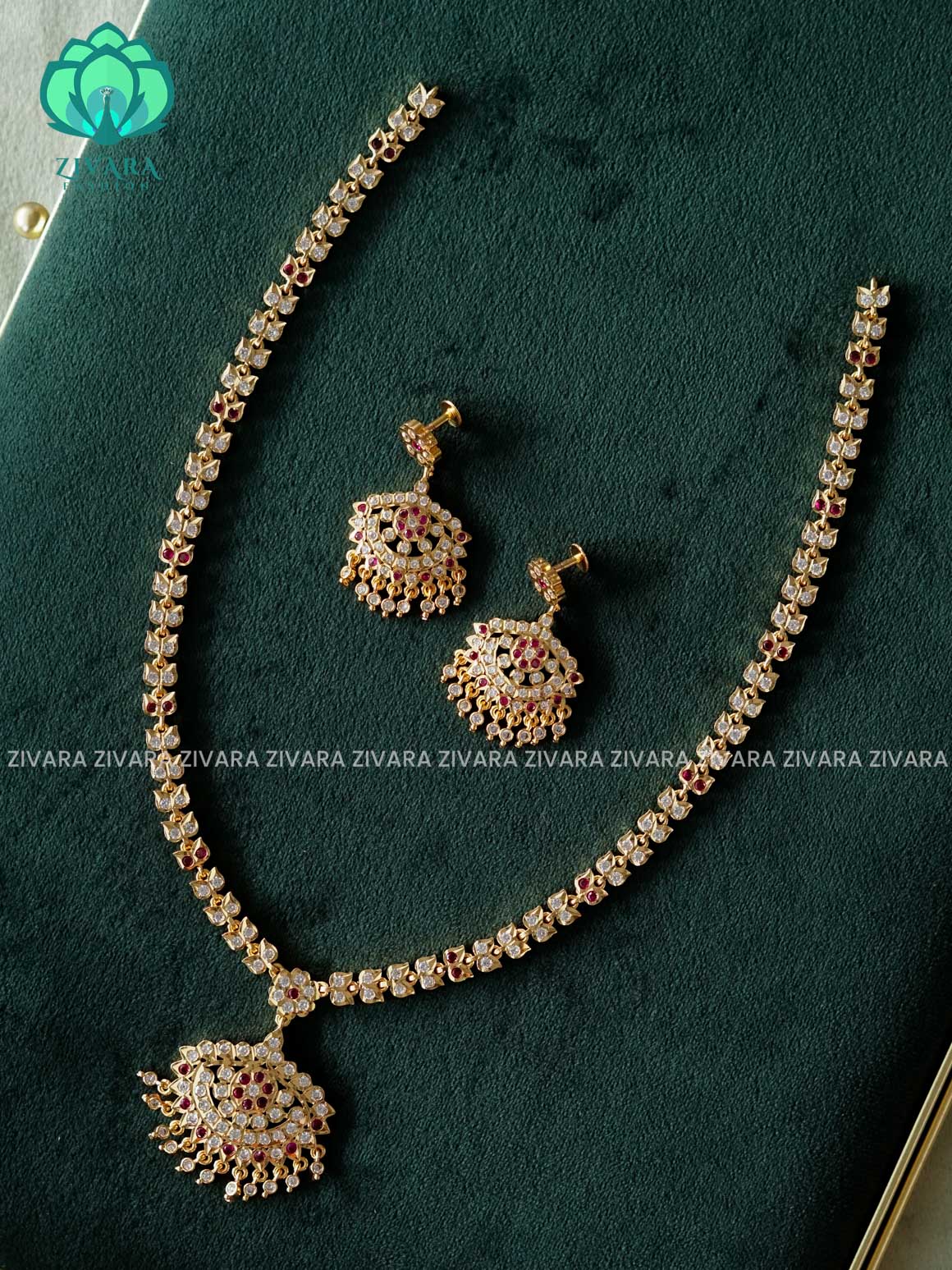 AMBIGAI -  RUBY WHITE STONE  MICROGOLD POLISH LONG HAARAM  with premium gold polish -Traditional south indian premium neckwear with earrings- Zivara Fashion- latest jewellery design