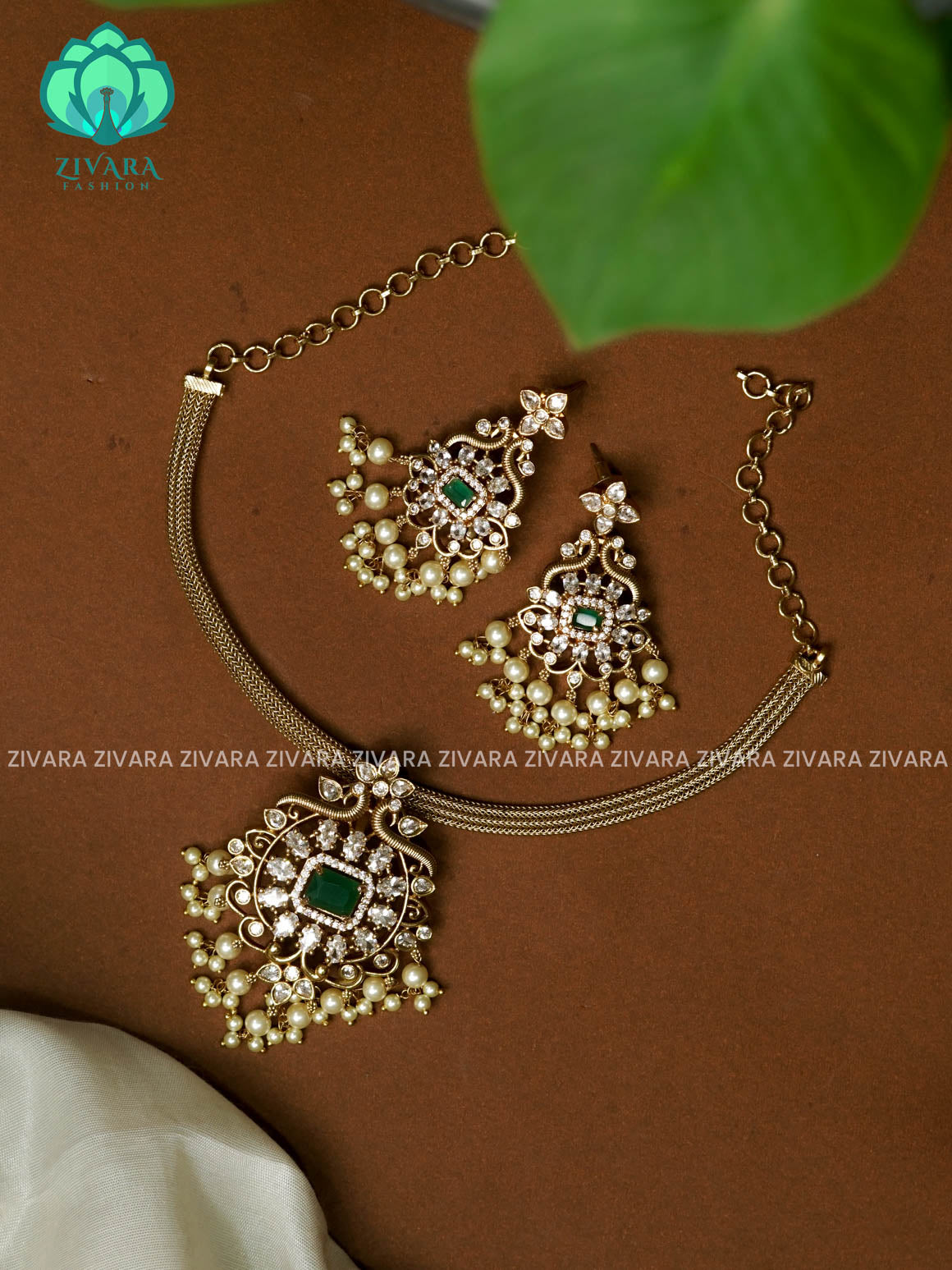 GREEN STONE FLEXIBLE CHAIN BIG PENDANT  -Traditional south indian NORMAL MATTE neckwear with earrings- Zivara Fashion- latest jewellery design