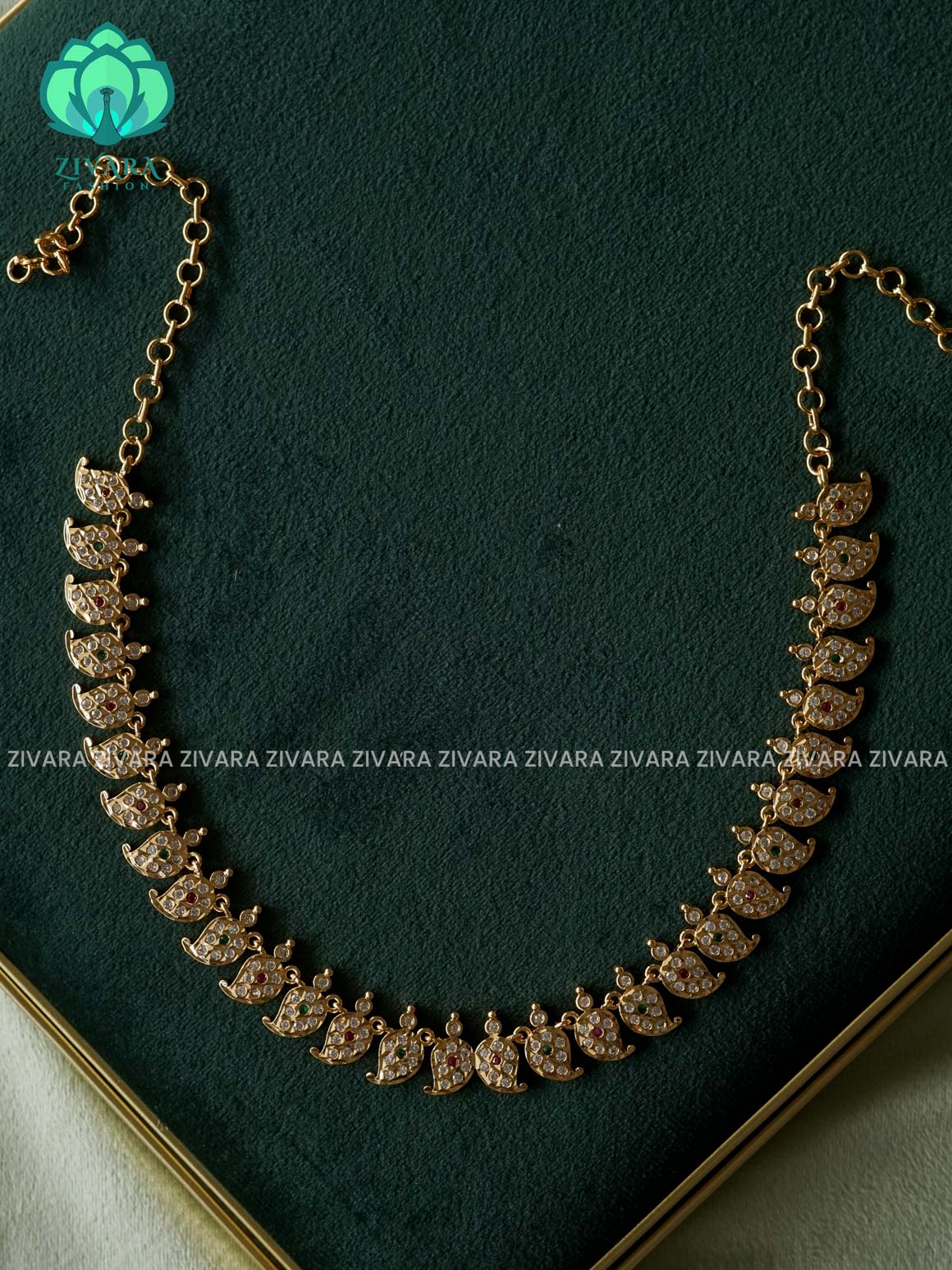 AMBIGAI-WHITE RUBY AND GREEN STONE MANGO MOTIF MICROGOLD POLISH ATTIGAI - Zivara Fashion- latest jewellery design