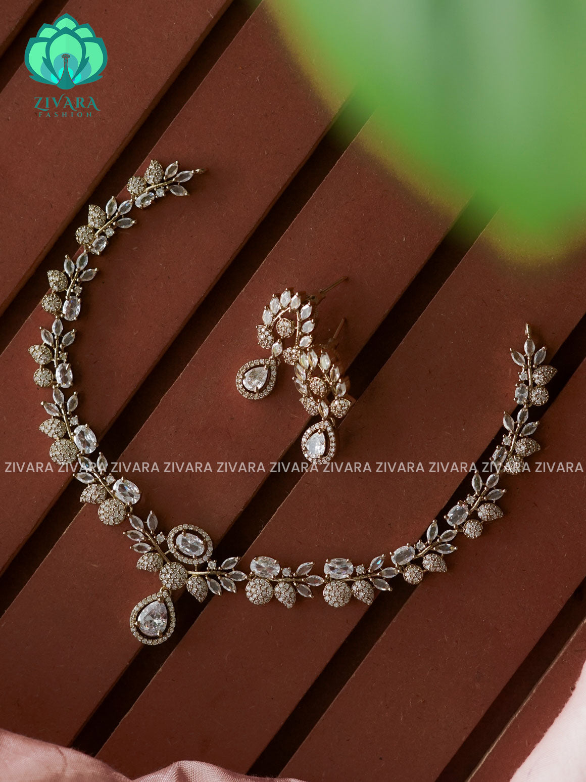 WHITE LEAF AND TEAR  pendant -Traditional south indian premium neckwear with earrings- Zivara Fashion- latest jewellery design.