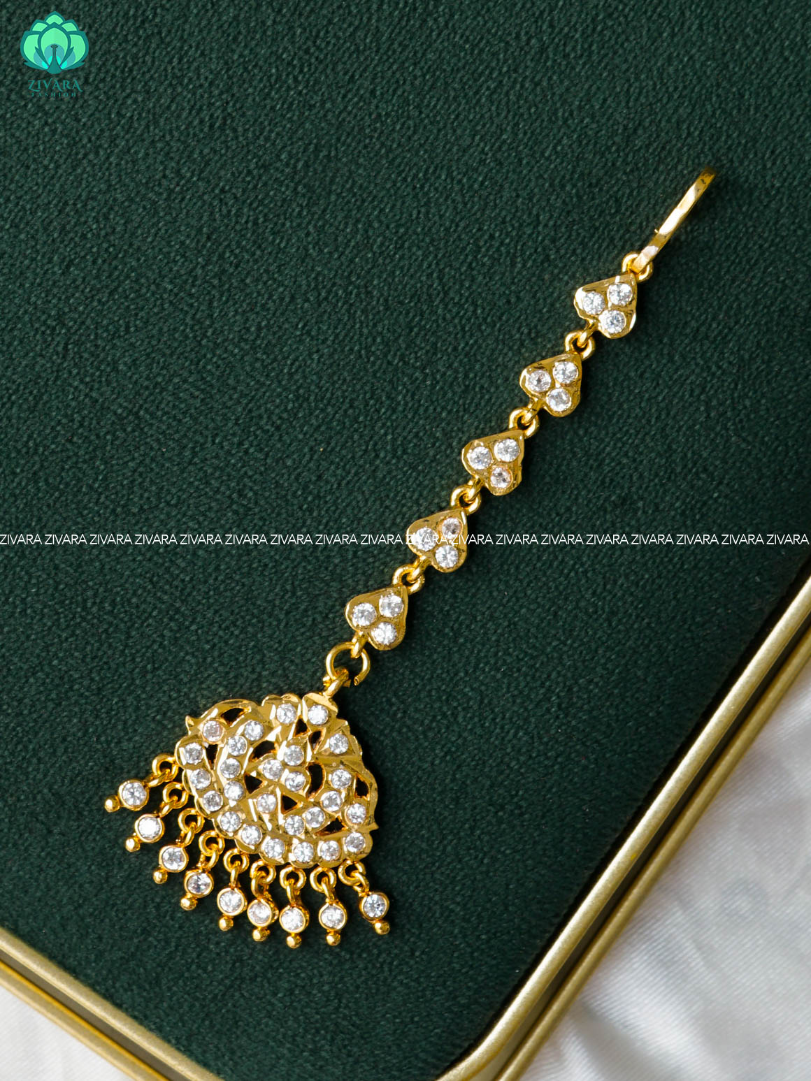 AMBIGAI- WHITE STONE TIKKA/CHUTTI MICROGOLD POLISH bridal head accessory- latest bridal collection - Zivara fashion