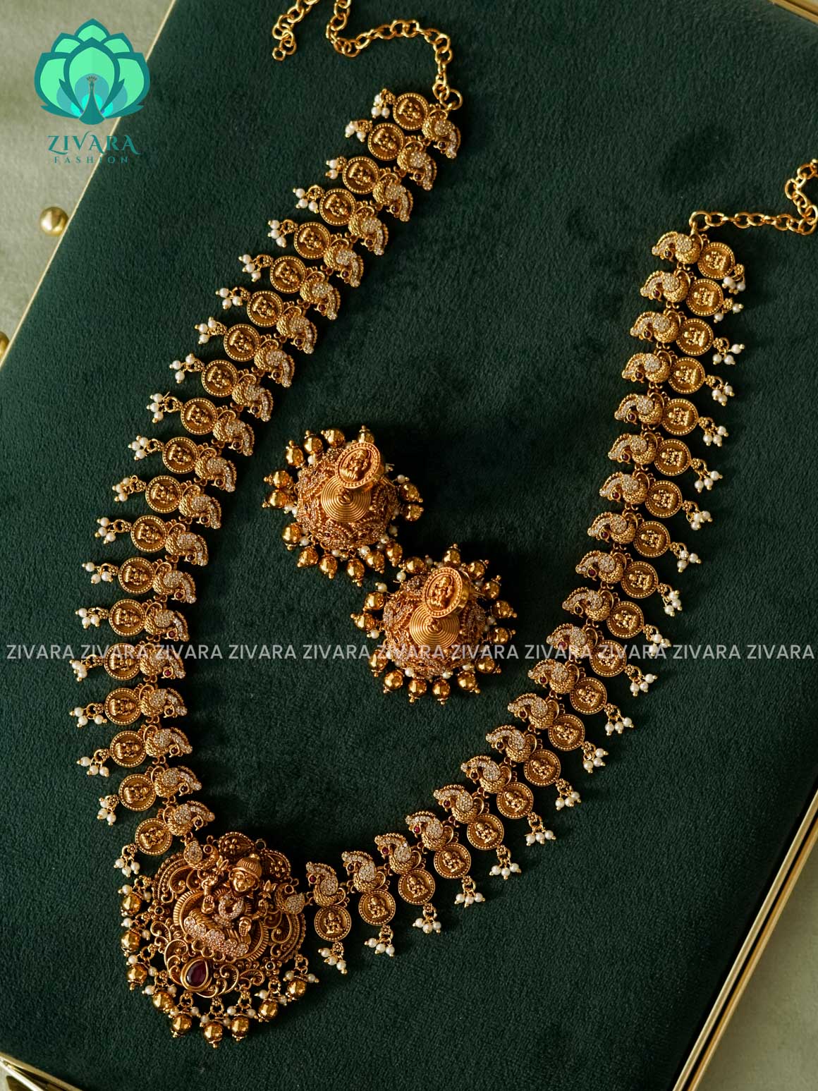 RUBY GREEN STONE PEACOCK WITH TEMPLE MOTIF - Traditional PREMIUM MATTE polish MIDCHEST haaram/neckwear with earrings- Zivara Fashion