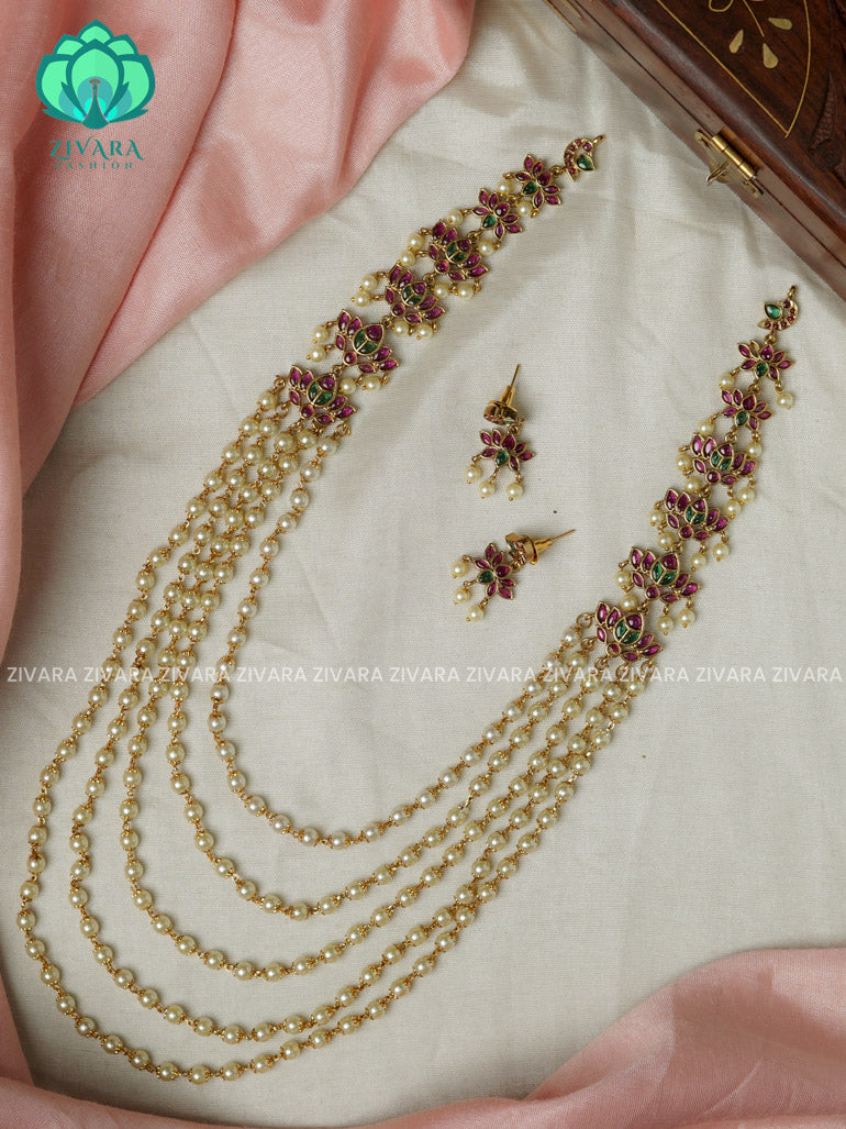 RUBY AND GREEN LOTUS-STEP PEARL CHAIN - Traditional PREMIUM MATTE polish MIDCHEST haaram/neckwear with earrings- Zivara Fashion