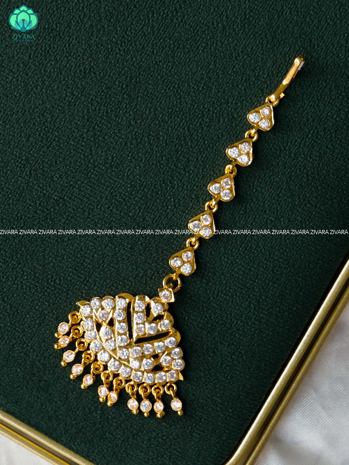 AMBIGAI- WHITE STONE TIKKA/CHUTTI MICROGOLD POLISH bridal head accessory- latest bridal collection - Zivara fashion