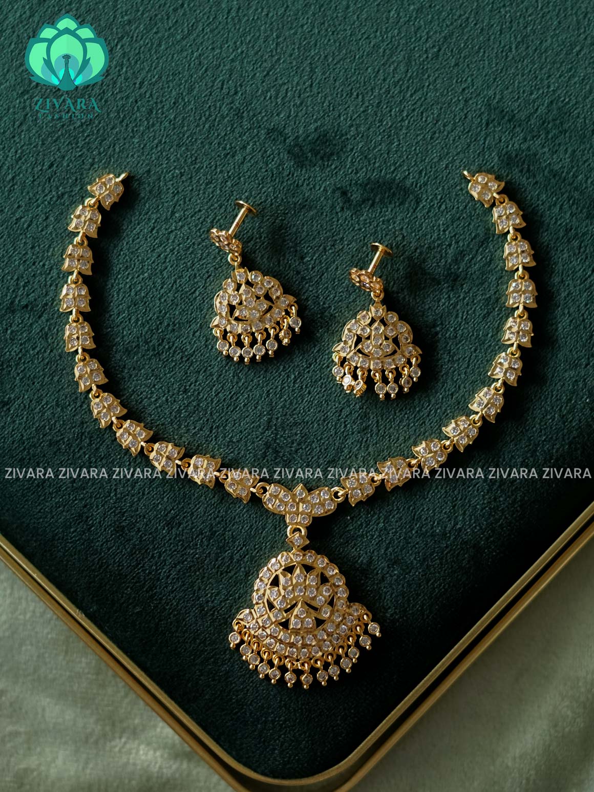 AMBIGAI-WHITE STONE LOTUS  MOTIF MICROGOLD POLISH ATTIGAI WITH EARRING - Zivara Fashion- latest jewellery design