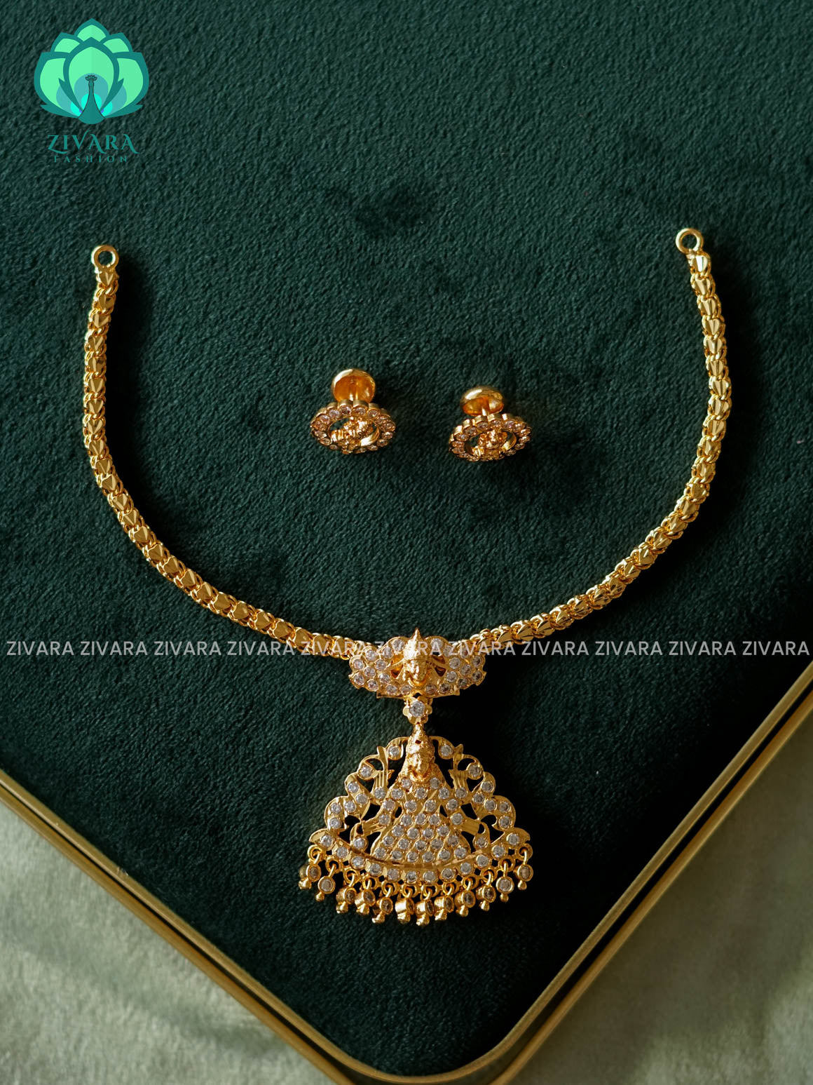 AMBIGAI- WHITE STONE LAKSHMI MOTIF MICROGOLD POLISH ATTIGAI WITH EARRING - Zivara Fashion- latest jewellery design