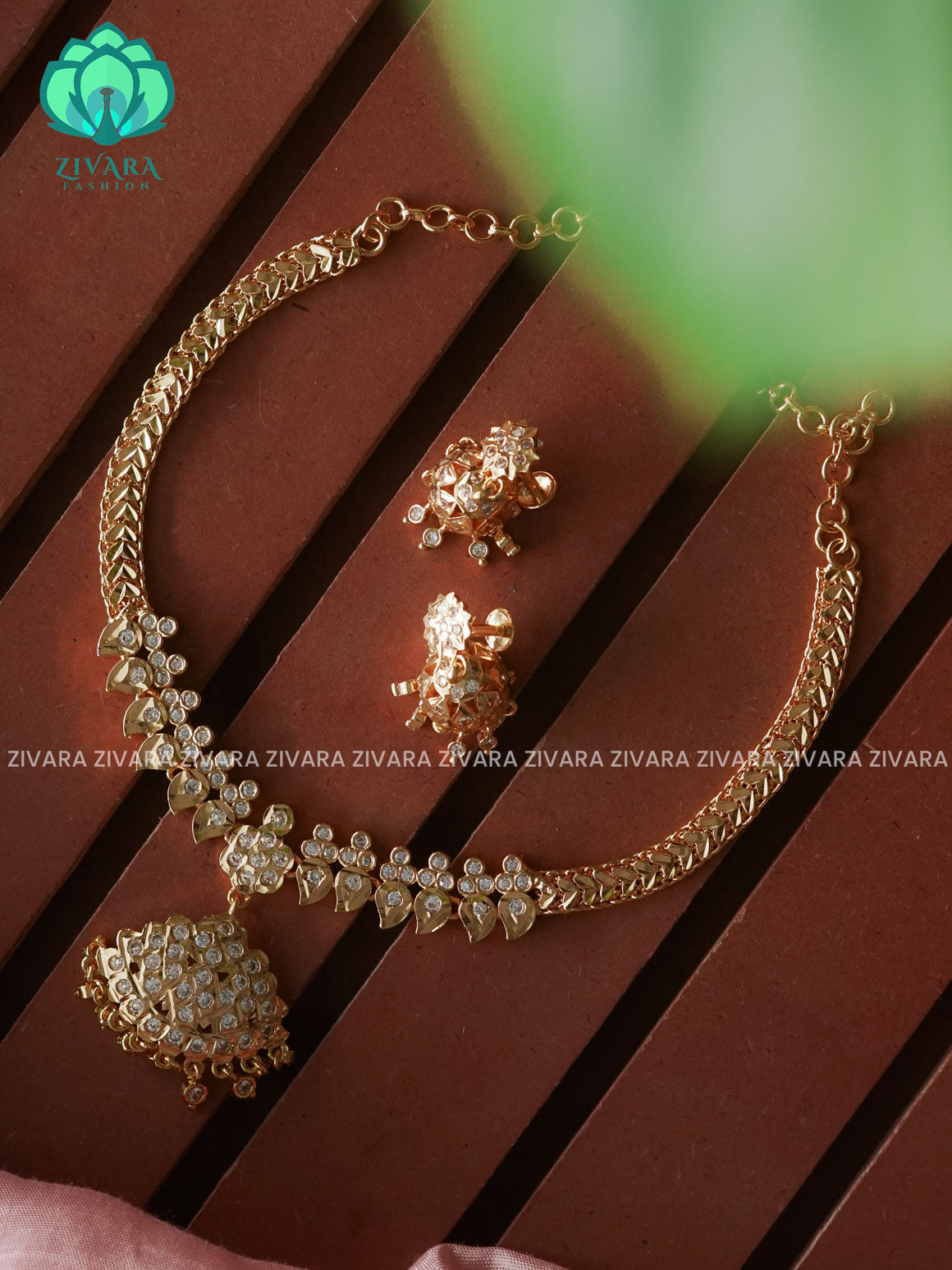WHITE STONE MOTIF FREE MICROGOLD POLISH ATTIGAI WITH EARRING - Zivara Fashion- latest jewellery desigN