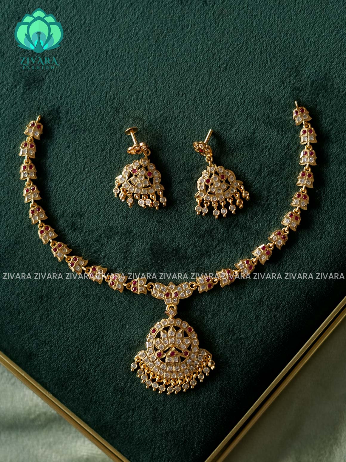 AMBIGAI- RUBY AND WHITE STONE LOTUS  MOTIF MICROGOLD POLISH ATTIGAI WITH EARRING - Zivara Fashion- latest jewellery desigN